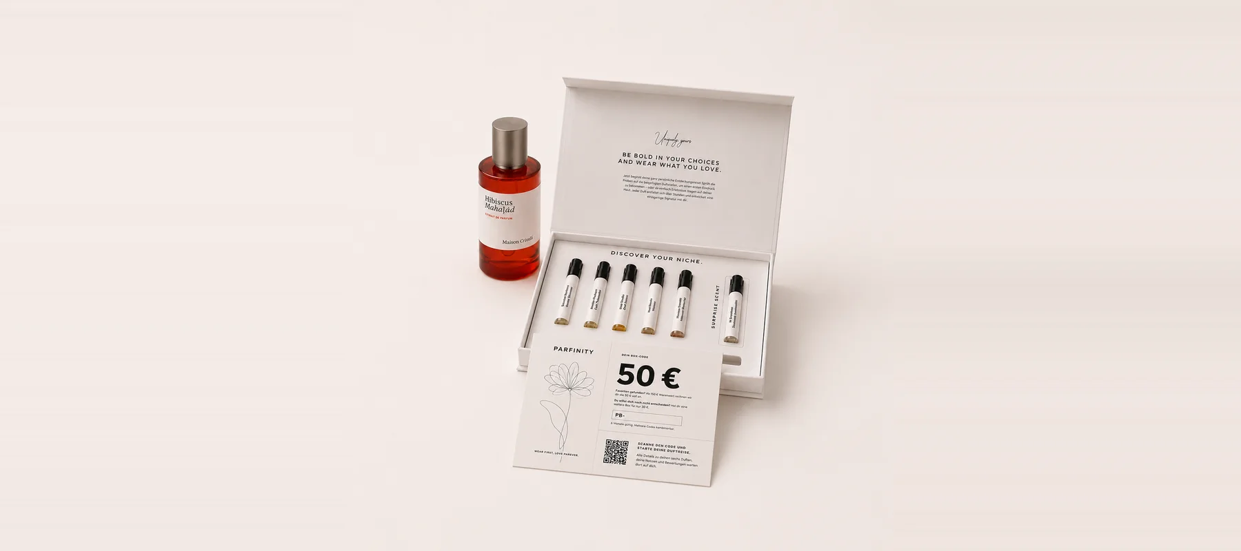Open Parfinity box with six fragrance samples, a bottle and the 50 euro discount code card